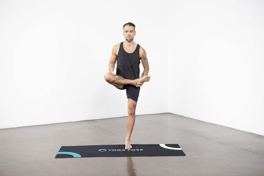 Half Bound Lotus Standing Pose (Ardha Baddha Padmottanasana) - Yoga Pose