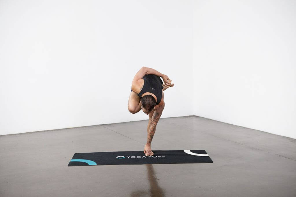 Half Bound Lotus Standing Pose (Ardha Baddha Padmottanasana) - Yoga Pose