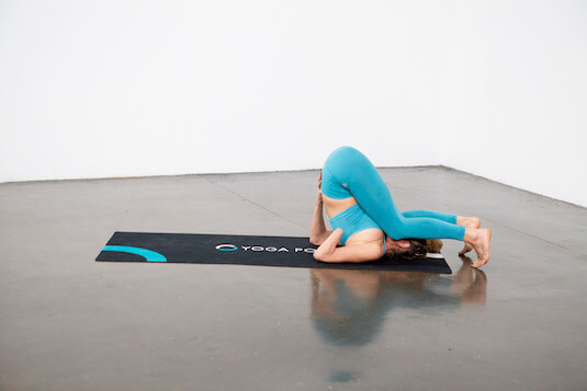 Plow Pose (Halasana) - Yoga Pose