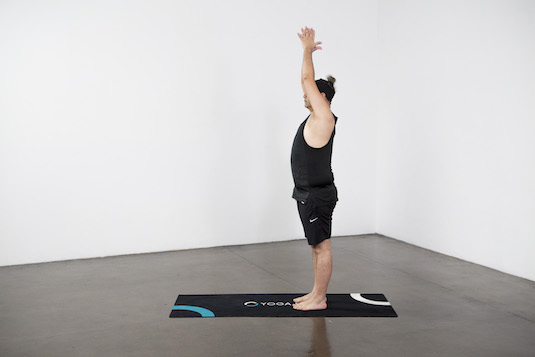 Standing Forward Fold With Clasped Elbows | 15 Expert-Recommended Yoga Poses  to Do Daily For Flexibility, Relaxation, and Pain Relief | POPSUGAR Fitness  UK Photo 3