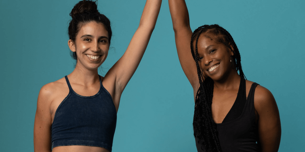 two-women-practicing-yoga