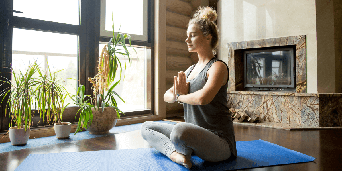 woman-practicing-yoga-in-the-morning