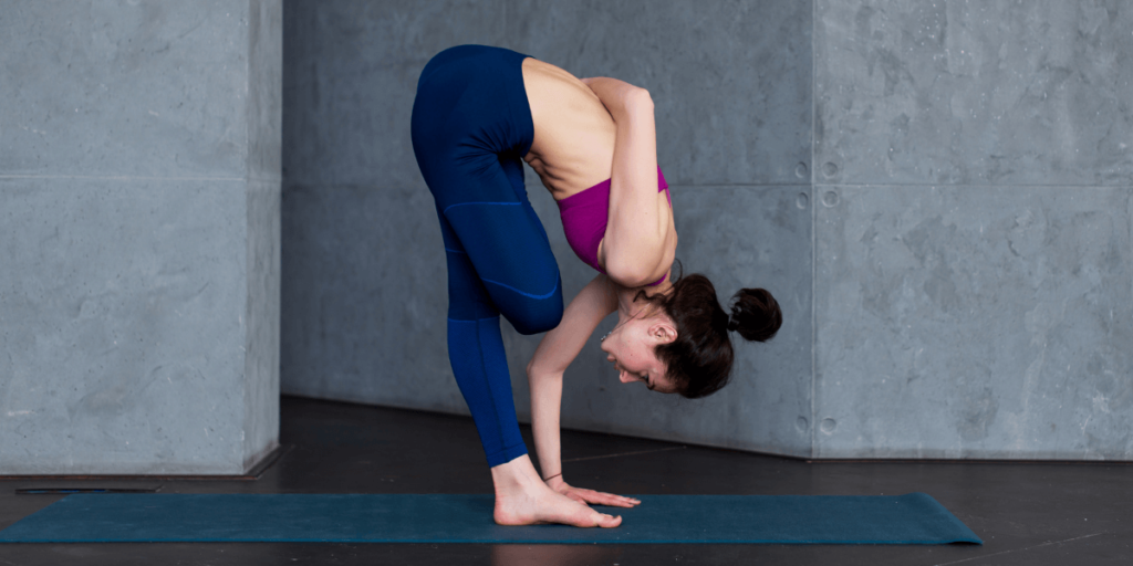 Baddha Uttanasana, also known as the bound standing forward fold, strengthens your inner thighs, knees, and groin.